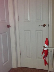 Creepy Elf on the Shelf keeps an eye out for naughty children.