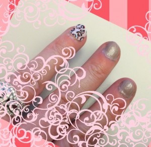 My Jamberry sample nail done in "Cheetah Illusions"  Ignore the other two nails that desperately need attention!